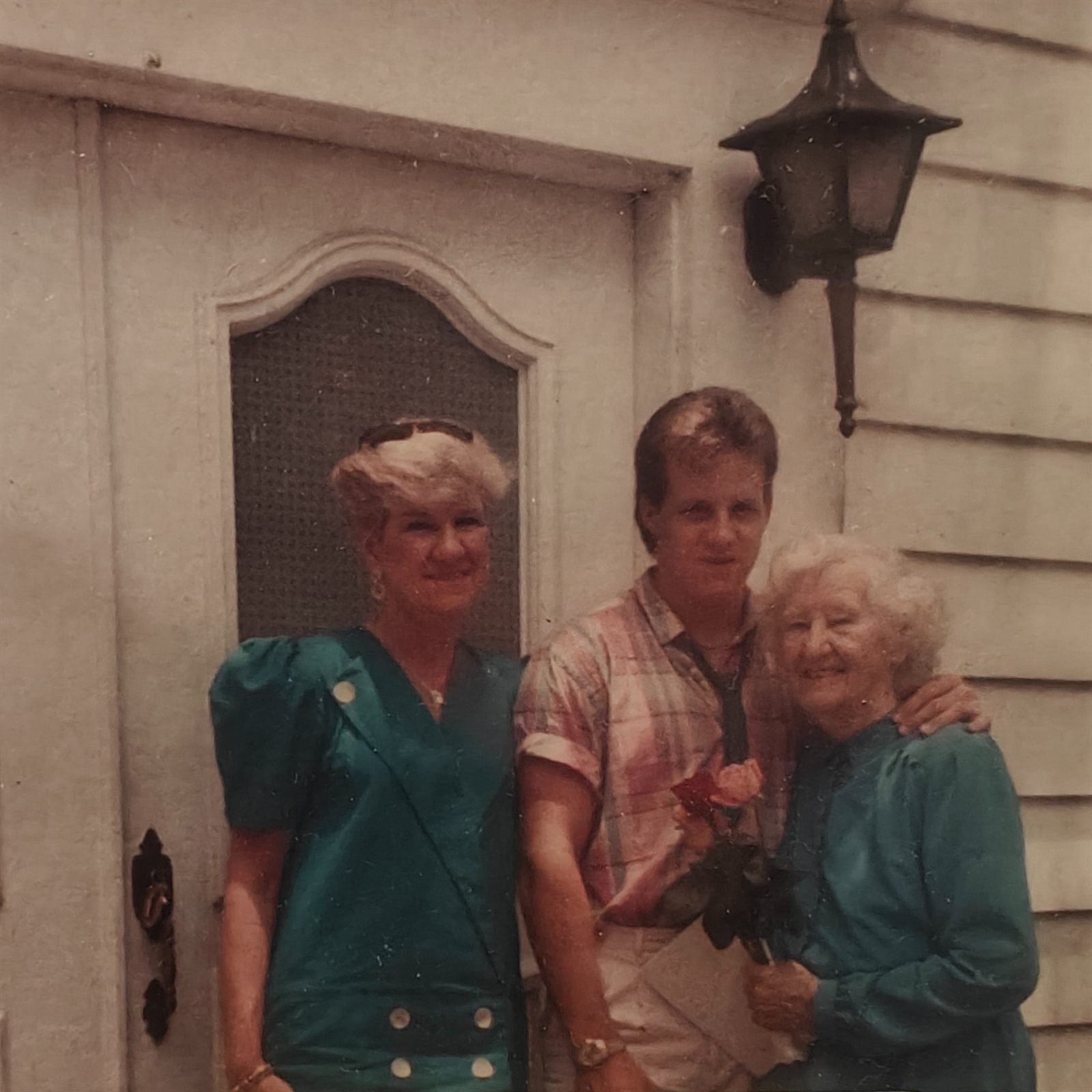 TY Cherry with his mother and grandmother