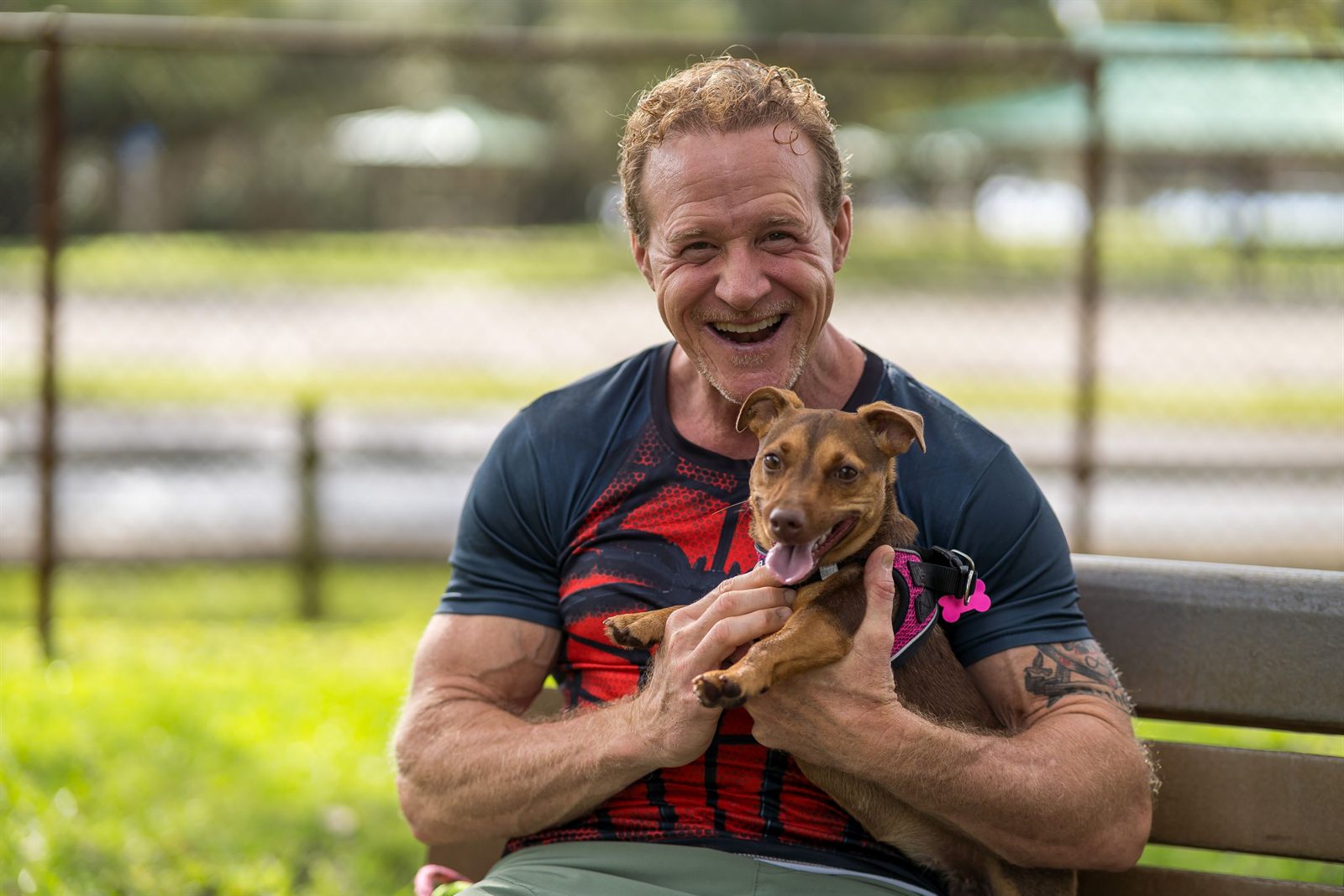 TY Cherry outdoors with one of the dogs